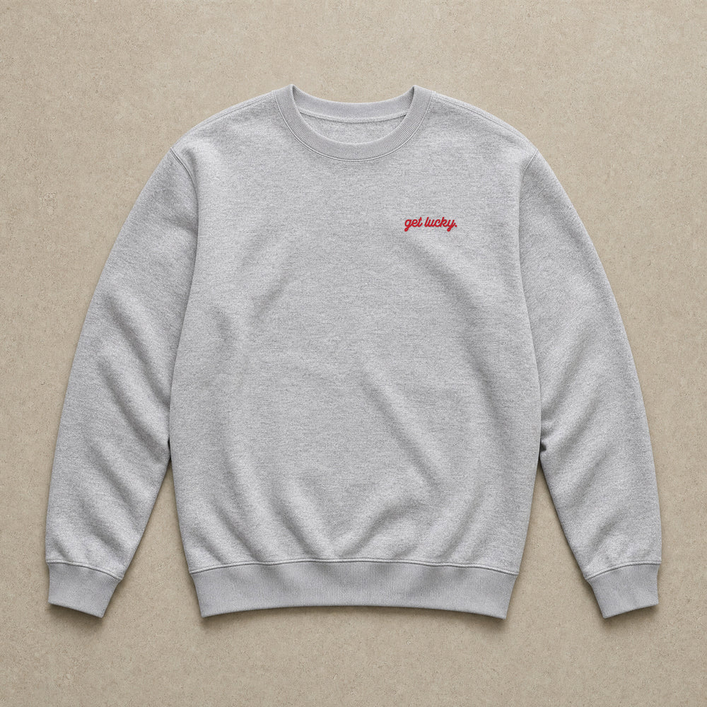 Rufus Packshot 2026 · Le Classique · Brodé « Get lucky. » · Gris