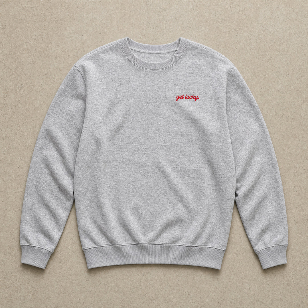 Rufus Packshot 2026 · Le Classique · Brodé « Get lucky. » · Gris