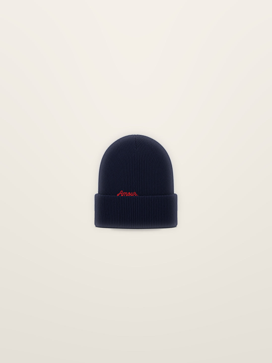 Le Bonnet · Brodé « Amour. », Bleu marine, à plat sur fond ivoire